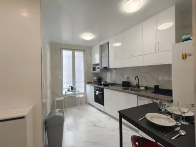 Cuisine ou kitchenette dans l'établissement Belleville 10
