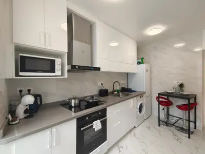 Cuisine ou kitchenette dans l'établissement Belleville 10