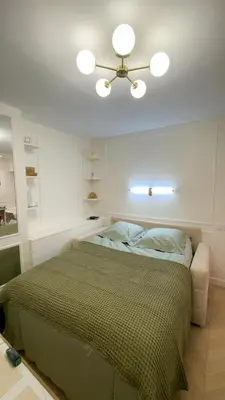 Un ou plusieurs lits dans un hébergement de l'établissement Chez Lucette Studio 17e Paris