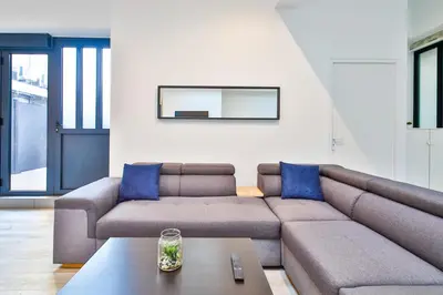 Coin salon dans l'établissement Best 8 Personnes Montrouge