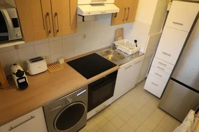 Cuisine ou kitchenette dans l'établissement Magnifique studio emplacement premium