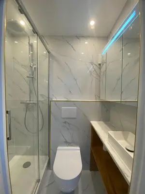 Salle de bains dans l'établissement Studio cosy près de l'Opéra avec lumière naturelle