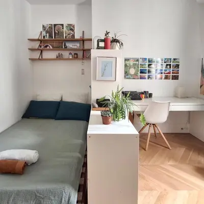 Un ou plusieurs lits dans un hébergement de l'établissement Spacious apartment with WiFi in the heart of Paris
