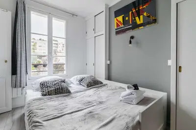 Un ou plusieurs lits dans un hébergement de l'établissement Studio Cosy proche tour Eiffel - Paris 7 - 2P