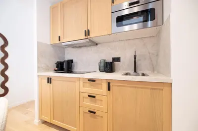 Cuisine ou kitchenette dans l'établissement Chic Flat in Paris Center