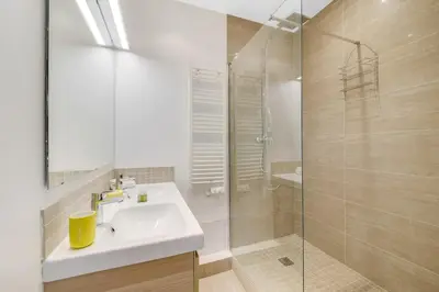 Salle de bains dans l'établissement Charming apartment near Eiffel Tower 2BR II