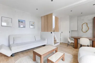 Coin salon dans l'établissement Maison de charme au coeur de Batignolles