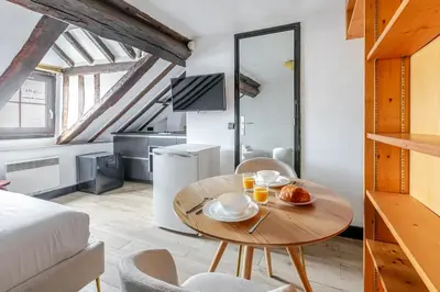 Coin salon dans l'établissement Studio cosy pour 2 au cœur de Paris