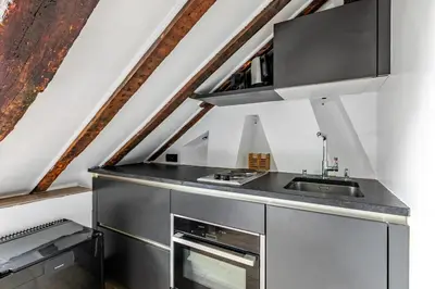 Cuisine ou kitchenette dans l'établissement Studio cosy pour 2 au cœur de Paris