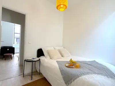 Un ou plusieurs lits dans un hébergement de l'établissement L'appartement Plaisance