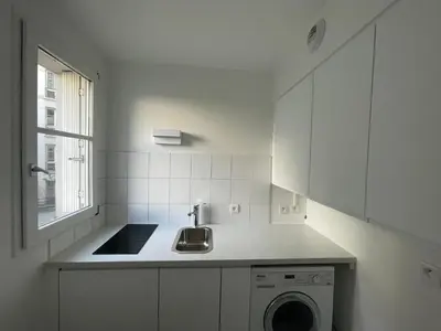 Cuisine ou kitchenette dans l'établissement Studio Jardin des Plantes