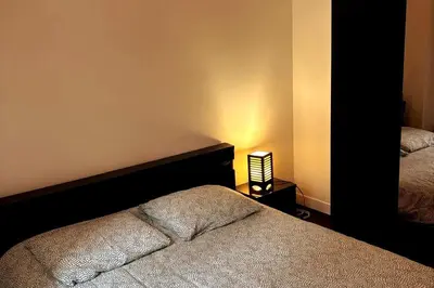 Un ou plusieurs lits dans un hébergement de l'établissement Pleasant apt wagram neighborhood