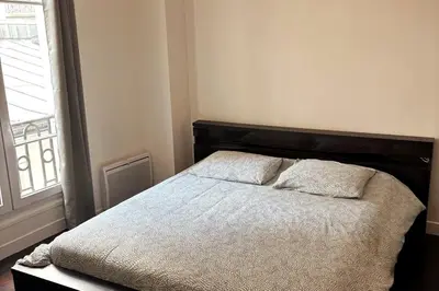 Un ou plusieurs lits dans un hébergement de l'établissement Pleasant apt wagram neighborhood