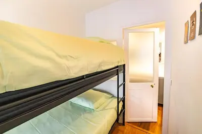 Un ou plusieurs lits dans un hébergement de l'établissement 6 Guests Flat - Jardin des Plantes
