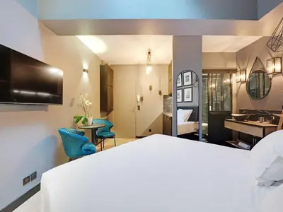 Un ou plusieurs lits dans un hébergement de l'établissement Charming studio -2P- Auteuil, cleaning included