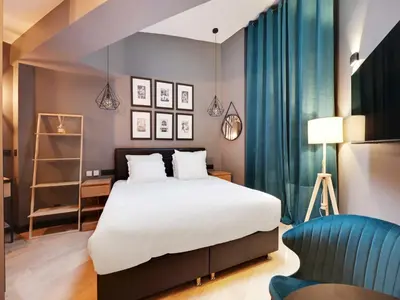 Un ou plusieurs lits dans un hébergement de l'établissement Charming studio -2P- Auteuil, cleaning included