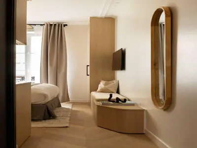 Un ou plusieurs lits dans un hébergement de l'établissement Charming Cosy Studio - 2P - Gare Saint Lazare, cleaning included