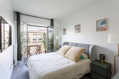 Un ou plusieurs lits dans un hébergement de l'établissement Très bel Appartement Neuilly