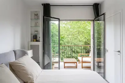 Coin salon dans l'établissement Très bel Appartement Neuilly