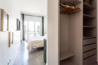 Un ou plusieurs lits dans un hébergement de l'établissement Très bel Appartement Neuilly