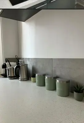 Cuisine ou kitchenette dans l'établissement Charmant appartement décoré proche du parc des expositions