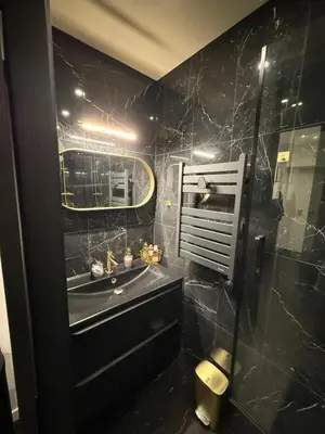 Salle de bains dans l'établissement Le secret du Moulin