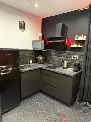 Cuisine ou kitchenette dans l'établissement Le secret du Moulin