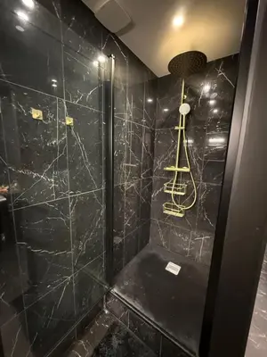 Salle de bains dans l'établissement Le secret du Moulin