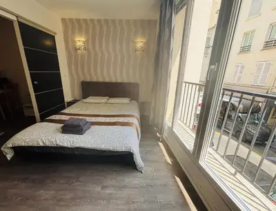 Un ou plusieurs lits dans un hébergement de l'établissement Apart 300m to Arc de Triomphe