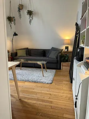 Coin salon dans l'établissement Joli appartement dans le centre de Paris