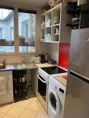 Cuisine ou kitchenette dans l'établissement Joli appartement dans le centre de Paris