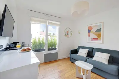 Cuisine ou kitchenette dans l'établissement Cosy Apartment -1BR-2P- Suresnes