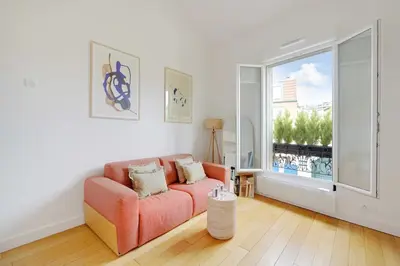 Coin salon dans l'établissement Appartement Moderne - 1BR-4P - Suresnes