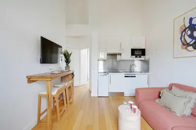 Cuisine ou kitchenette dans l'établissement Appartement Moderne - 1BR-4P - Suresnes