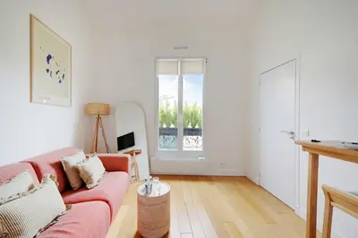 Coin salon dans l'établissement Appartement Moderne - 1BR-4P - Suresnes