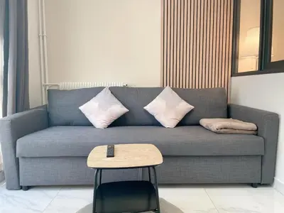 Coin salon dans l'établissement New Apartment in Paris center metro 7 & 14 Maison Blanche