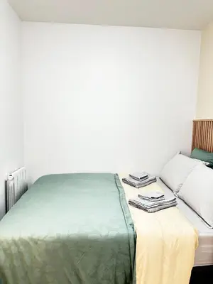 Un ou plusieurs lits dans un hébergement de l'établissement New Apartment in Paris center metro 7 & 14 Maison Blanche