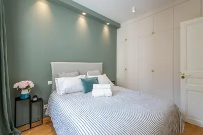Un ou plusieurs lits dans un hébergement de l'établissement Chic apartment 1BR-2P - Arc de Triomphe
