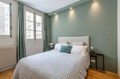 Un ou plusieurs lits dans un hébergement de l'établissement Chic apartment 1BR-2P - Arc de Triomphe
