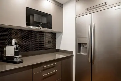 Cuisine ou kitchenette dans l'établissement Rue Cler Charm