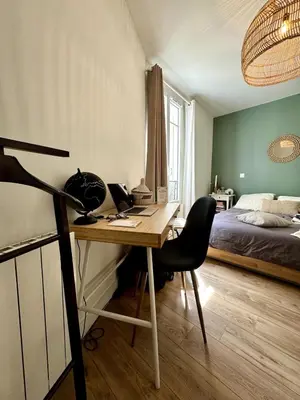 Un ou plusieurs lits dans un hébergement de l'établissement Appartement niché au cœur de Montmartre