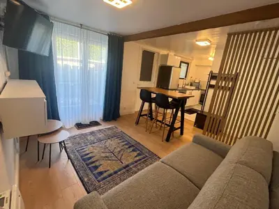 Télévision ou salle de divertissement dans l'établissement Malakoff Appart 2 pièces cozy proche de Paris RANKOS