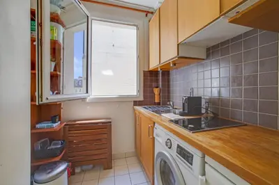 Cuisine ou kitchenette dans l'établissement Tiny House Champs Elysées