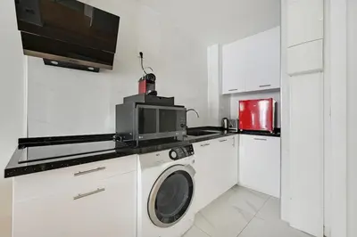 Cuisine ou kitchenette dans l'établissement La Suite de Chatelet