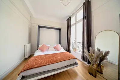 Un ou plusieurs lits dans un hébergement de l'établissement Stylish Studio - Champs-Élysées - Perfect Paris Stay