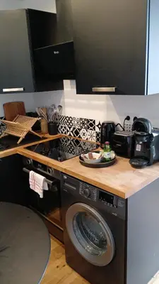 Cuisine ou kitchenette dans l'établissement Studio familial