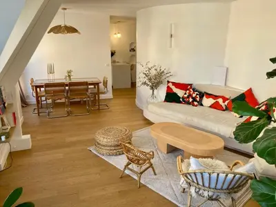 Coin salon dans l'établissement Beautiful kids friendly apartment with Montmartre view
