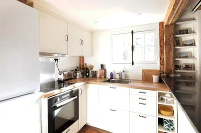 Cuisine ou kitchenette dans l'établissement Ganneron - CI - Welcoming studio for 2p - Paris 18
