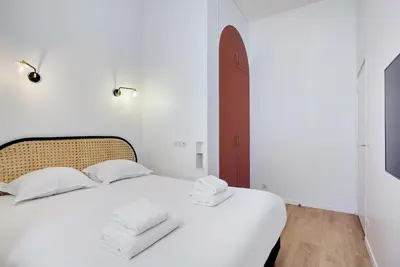 Un ou plusieurs lits dans un hébergement de l'établissement Parisian stay close to Montmartre - 2BR 8P