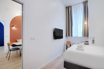 Un ou plusieurs lits dans un hébergement de l'établissement Parisian stay close to Montmartre - 2BR 8P